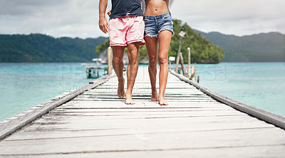 Buy stock photo Travel couple, walking and beach deck on holiday with freedom and love in summer in Thailand. Tropical nature, sea and legs of people on a boardwalk walk in the sun on vacation break by ocean water