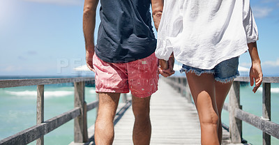 Buy stock photo Couple, walking and beach travel deck on holiday with freedom and love in summer in Thailand. Tropical nature, sea and back of people on a boardwalk walk in the sun on vacation break by ocean water