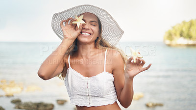 Buy stock photo Woman, beach and hand with pineapple by face on holiday for tropical, vacation or nutrition on trip. Happy, summer and person with fruit in star shape by ocean for diet, health and travel in Bali