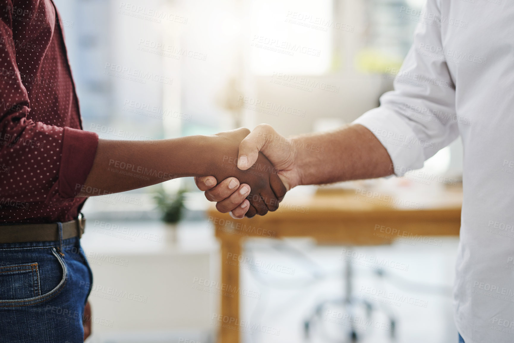 Buy stock photo Handshake, agreement and meeting of business people in the office after a good deal. Closeup of diverse corporate employees greeting at the workplace in unity, support and trust