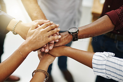Buy stock photo Business people hands stacked showing unity, teamwork and collaboration gesture for a project goal at a team meeting. Group closeup of corporate workers joining, working together and standing united