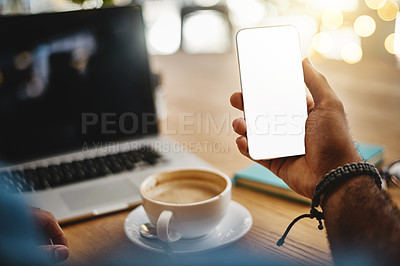 Buy stock photo Cropped shot of an unrecognizable businessman sitting alone in a cafe and using his cellphone during the day