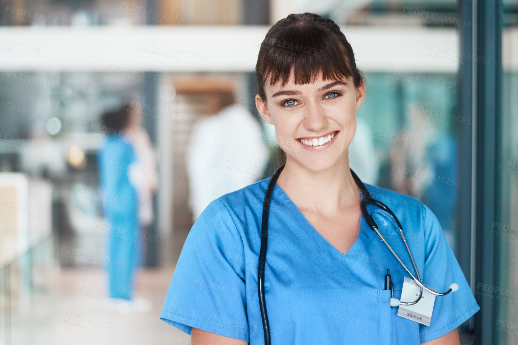 Buy stock photo Portrait, happy woman and proud nurse in clinic for healthcare services, career and medicine. Face, medical professional or confident female surgeon with smile at wellness hospital ready for nursing