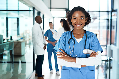 Buy stock photo Doctor, woman and happy with arms crossed in hospital for healthcare service, medical support or insurance. Professional nurse, portrait and surgeon in clinic for health treatment, scrubs or wellness