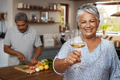 Buy stock photo Portrait of old couple in kitchen, wine and cooking, cheers to  healthy food together in home. Toast, smile and senior woman with glass in house with man, meal prep and happy lunch diet in retirement