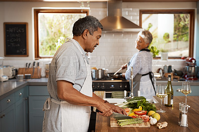 Buy stock photo Cooking, vegetables and old man with woman in kitchen, happiness and healthy bonding time in home. Marriage, love and food, senior couple with meal prep for vegetable dinner with retirement wellness.