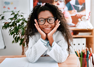 Buy stock photo Portrait of an adorable young school girl feeling cheerful in science class at school