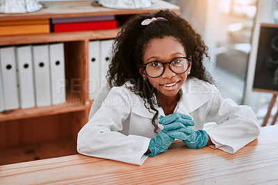 Buy stock photo Portrait of an adorable young school girl feeling cheerful and confident in science class at school