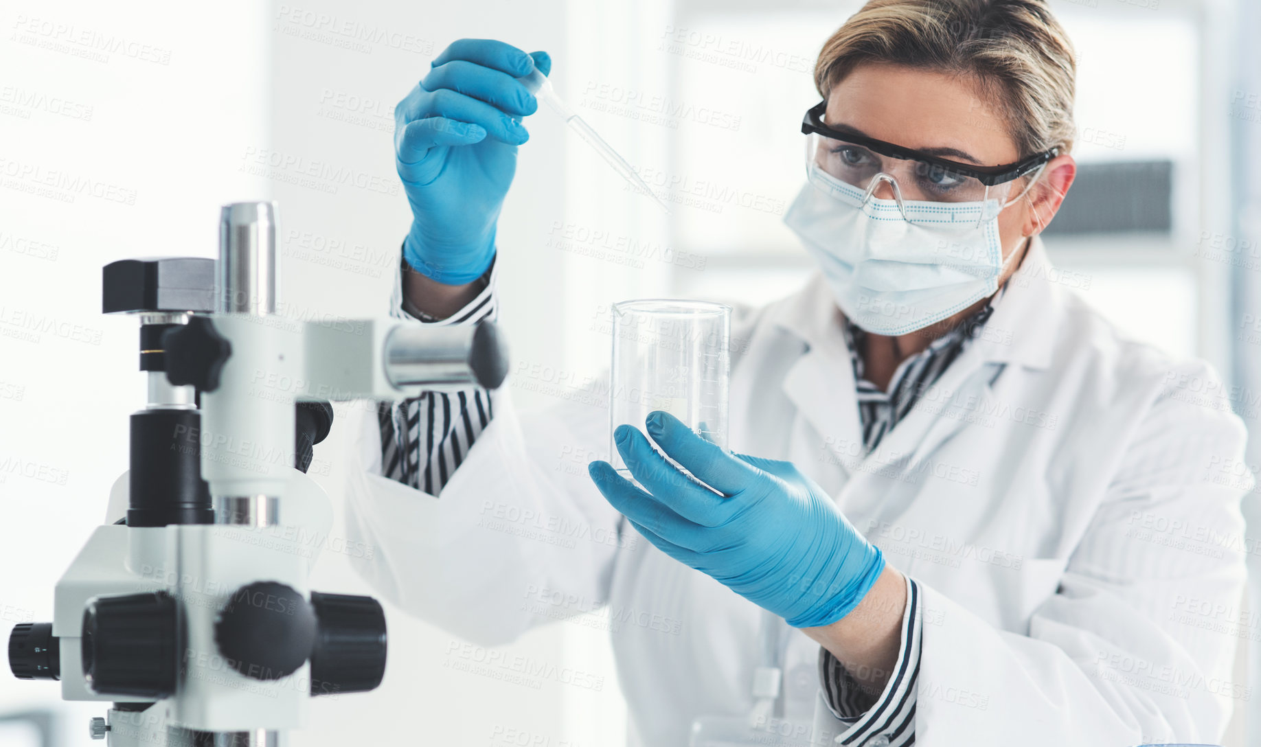 Buy stock photo Woman, scientist and dropper with liquid in lab of microscope, chemical experiment or monkeypox process. Researcher, chemistry and biotech for investigation analysis, Denmark study and medical cure