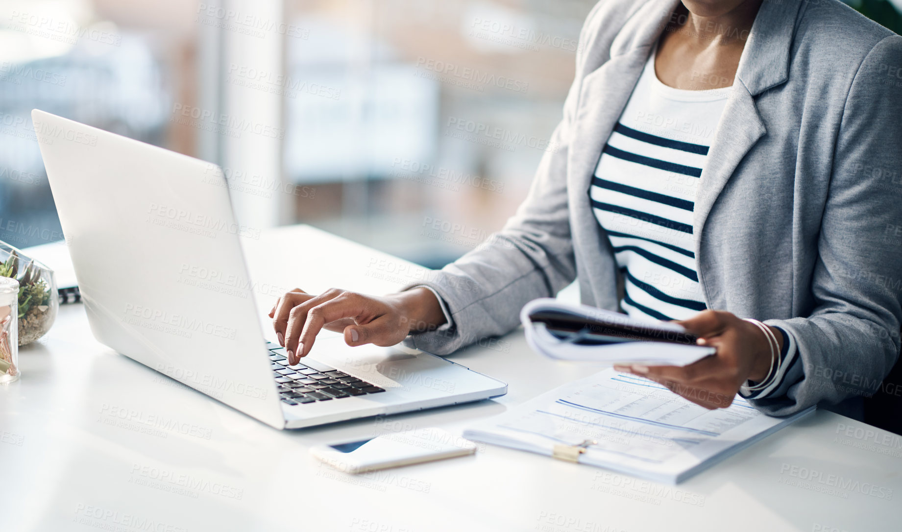 Buy stock photo Woman, hands and laptop with documents for finance, budget planning or accounting at office. Closeup of female person, accountant or employee with paperwork for financial advice or audit at workplace