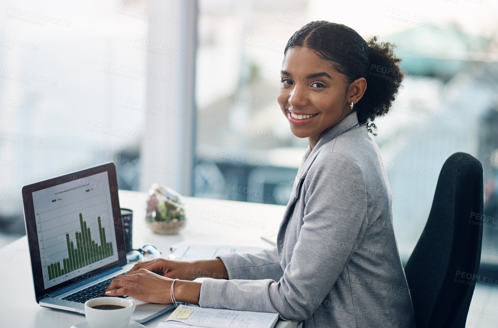Buy stock photo Data, laptop and portrait of accountant woman working on financial strategy as growth at startup company with smile. Happy, computer and African financial advisor excited for progress on graph report