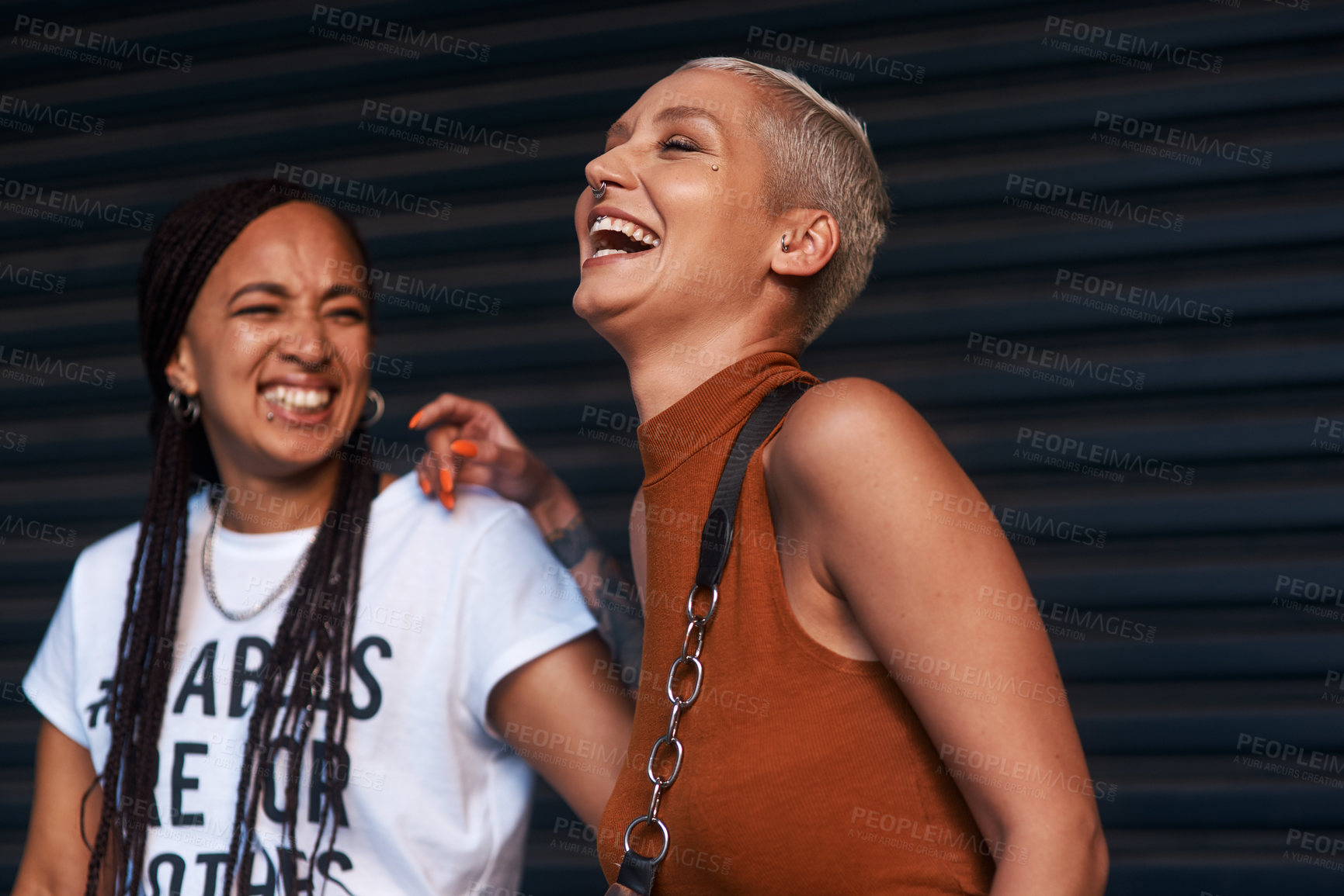 Buy stock photo Girls, people and laughing in fashion outdoor with streetwear, casual style and trendy outfit with confidence. Friends, face and happy in city with bonding, embrace and funny joke in town in summer