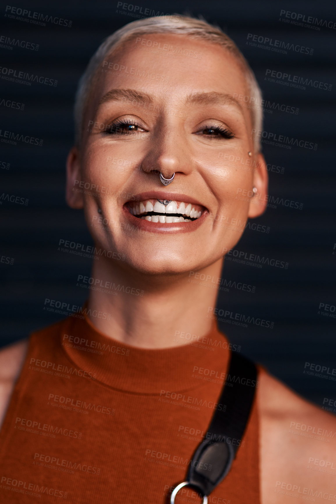 Buy stock photo Portrait, smile and woman with urban fashion, confidence and happy energy on weekend on dark background. Face, trendy style and gen z girl with pride, carefree streetwear and positive attitude