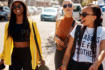 Buy stock photo Shot of three close friends spending the day together in the city