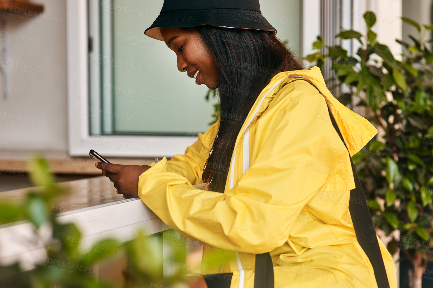 Buy stock photo Coffee shop, happy and black woman with phone online for social media, networking and internet. Cafeteria, restaurant and person on smartphone for typing message, chat and mobile website in cafe