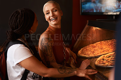 Buy stock photo Cropped shot of friends ordering pizza at a cafe together