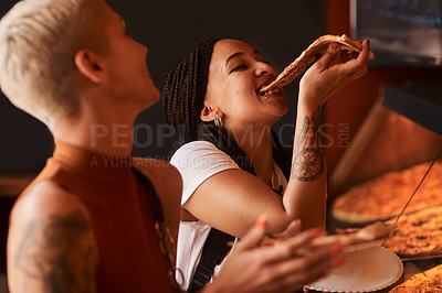 Buy stock photo Cropped shot of friends having pizza at a cafe together