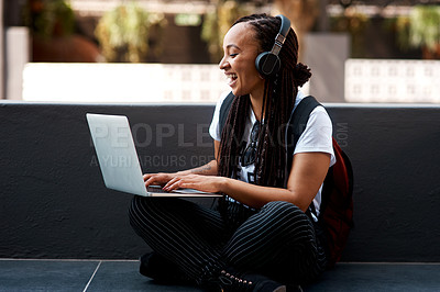 Buy stock photo Woman, student and headset or laughing with laptop, typing and online classes for elearning or education. University, learner and website research for assignment, listening and podcast or project