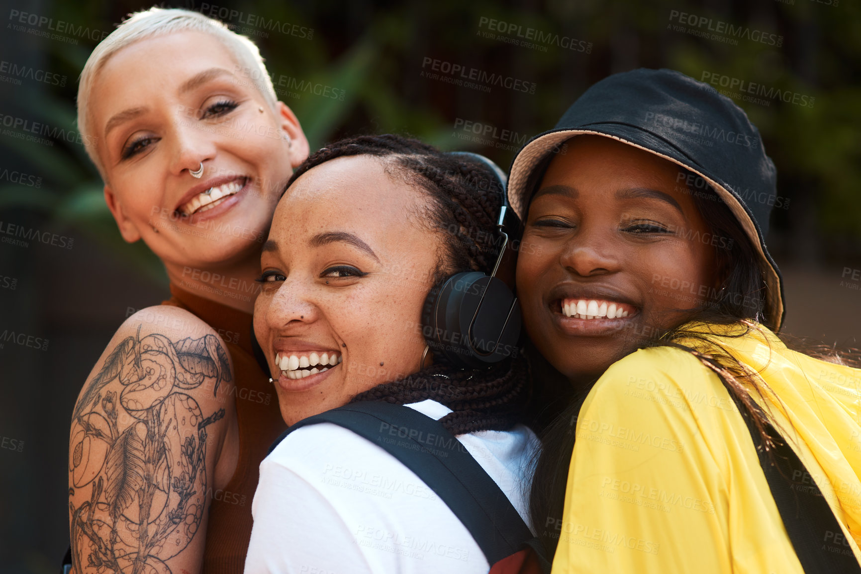 Buy stock photo Friends, girls and hug outdoor with portrait for bonding, funny joke or streetwear with support in nature. People, women and happy face in town with edgy style, trendy clothes and confident embrace