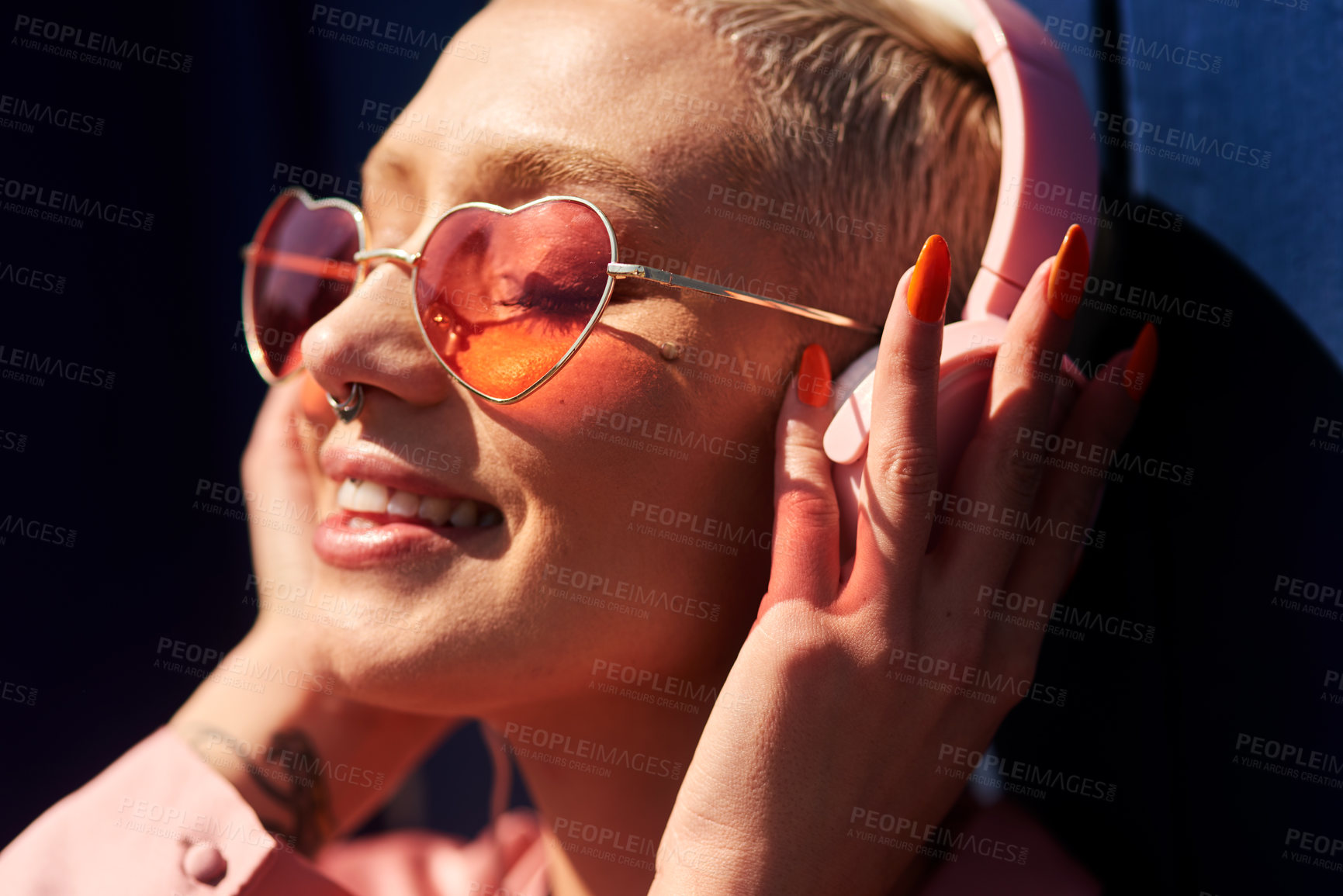 Buy stock photo Music, headphones and happy for podcast in the sun, heart glasses and radio with peace. Smile, streaming and female from Canada listening to song audio in urban town and online, track or relax