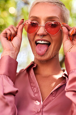 Buy stock photo Tongue out, woman and sunglasses in portrait for vacation, weekend trip and holiday in California. Nature, happy girl and shades for sunshine with confidence, fashion or excited with pride for travel