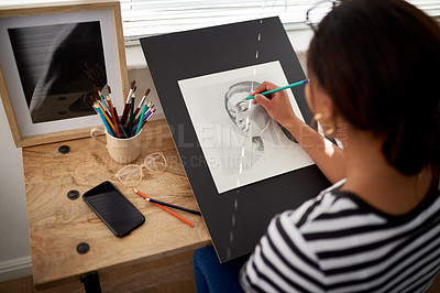 Buy stock photo Rearview of shot of an unrecognizable female artist drawing a portrait of a woman inside her studio