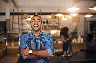 Buy stock photo Coffee shop, waiter and portrait of black man laugh in restaurant for cafe service, working and crossed arms. Small business owner, bistro startup and happy male barista in cafeteria ready to serve