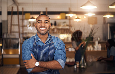 Buy stock photo Coffee shop, crossed arms and portrait of black man in restaurant for service, working and happy in cafe. Small business owner, bistro startup and confident male waiter in cafeteria ready to serve