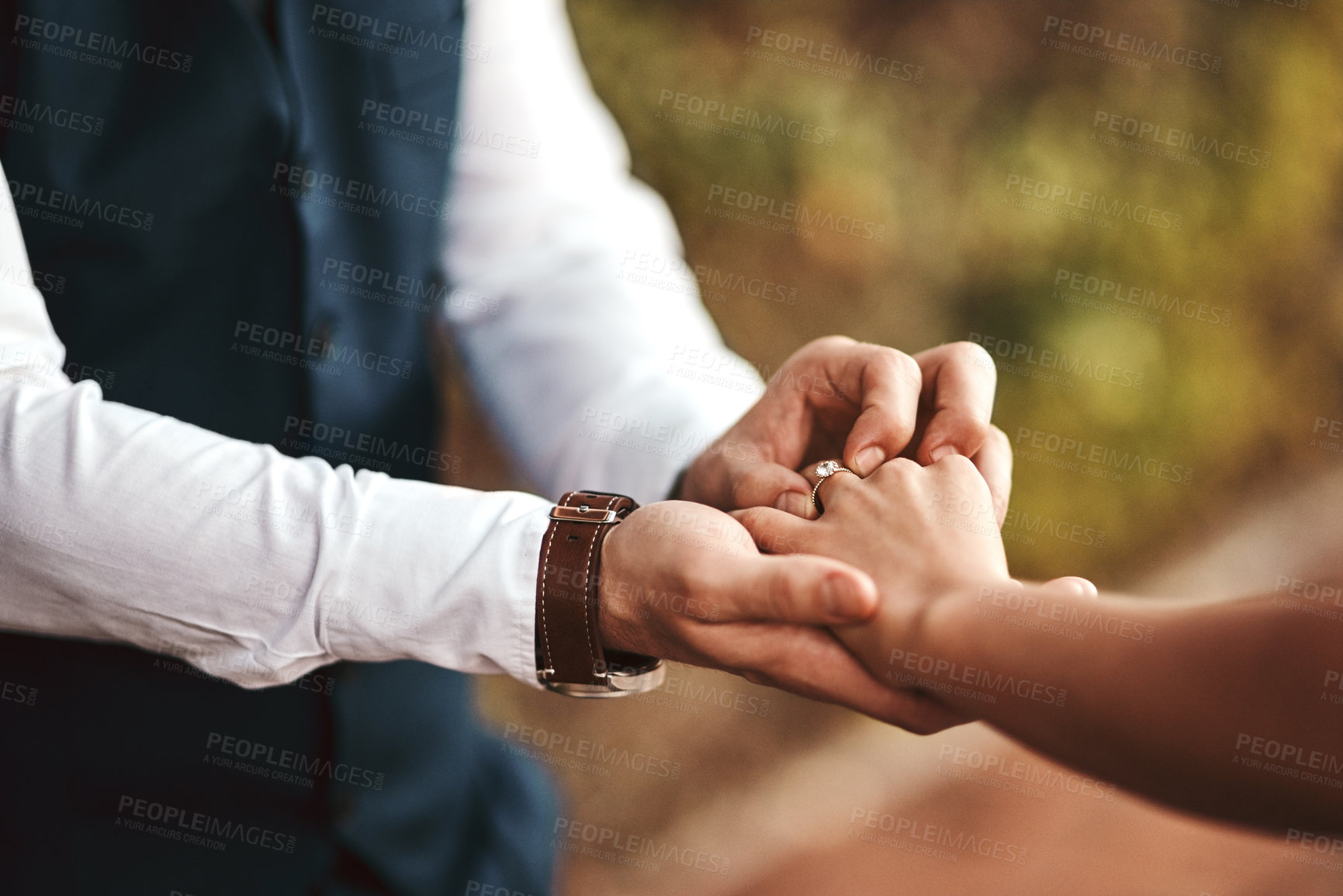 Buy stock photo Closeup, love and man with woman, ring for celebration and romance for relationship, outdoor or achievement. Zoom, couple or wedding band for bonding, loving together or romantic gesture for marriage