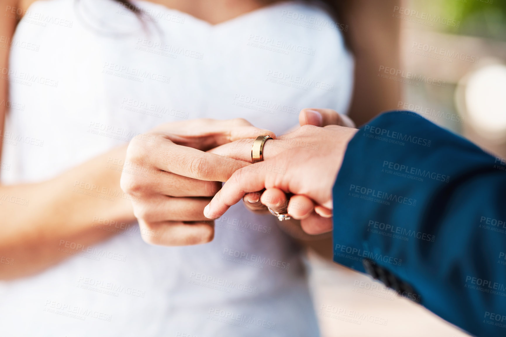 Buy stock photo Couple, hands and wedding ring in outdoors, ceremony and symbol for promise of loyalty or commitment. People, fingers and unity or icon for partnership, support and trust in marriage or relationship