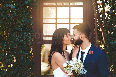 Buy stock photo Window, kiss and couple at sunset wedding with love in celebration of marriage and happiness. Bride, groom and people show care and support in romantic commitment with event in summer countryside
