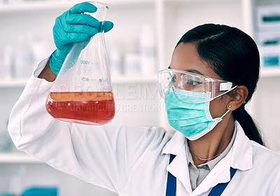 Buy stock photo Liquid, woman and chemistry with beaker in laboratory for experiment, research or vaccine analysis. Science, healthcare and medicine person for molecule structure, developing cure or innovation