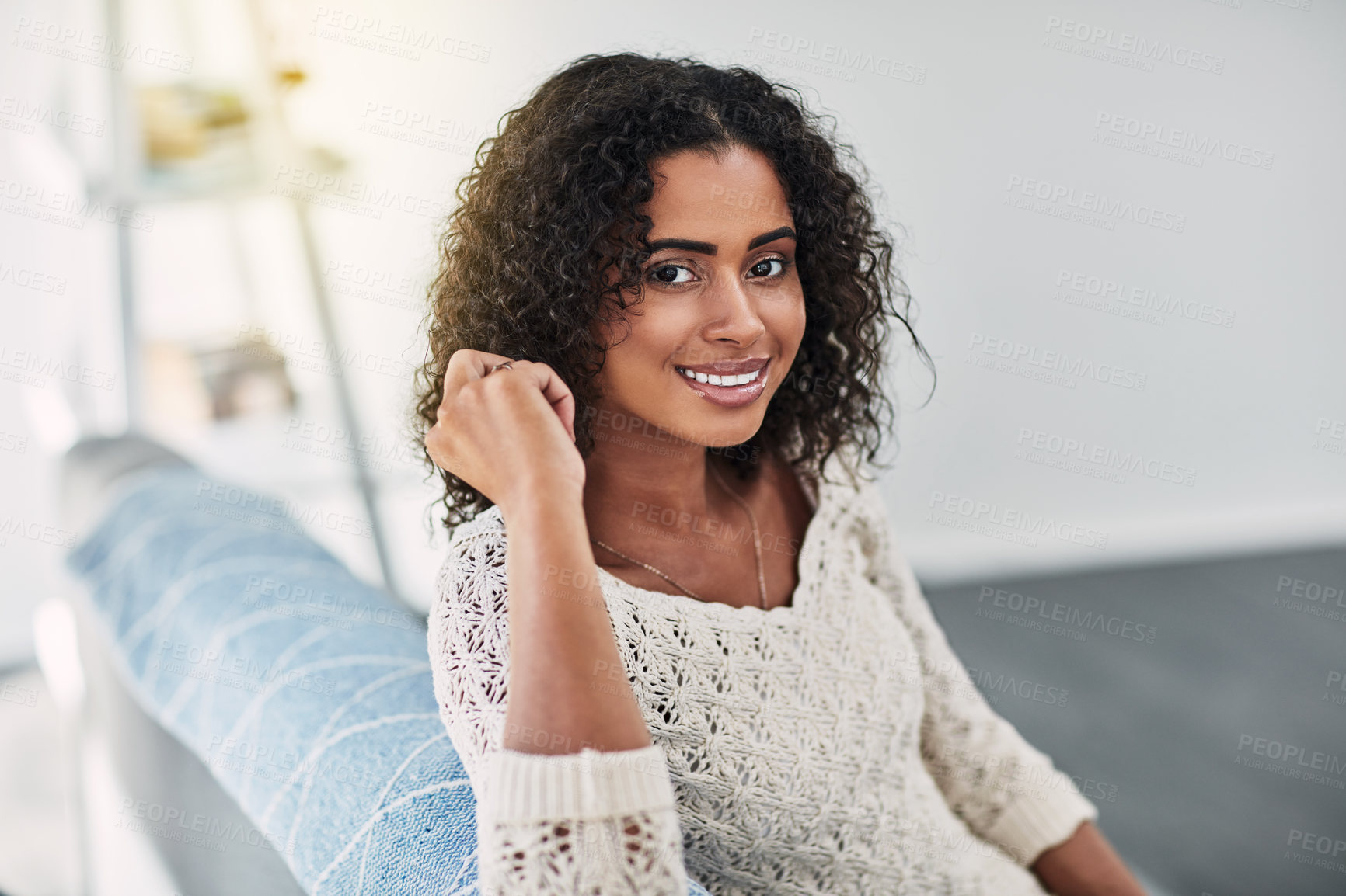 Buy stock photo Happy woman, portrait and relax on sofa in home for comfort, peace and lazy weekend with break. Female person, face and chill on couch in apartment for leisure, morning and positive attitude in Cuba