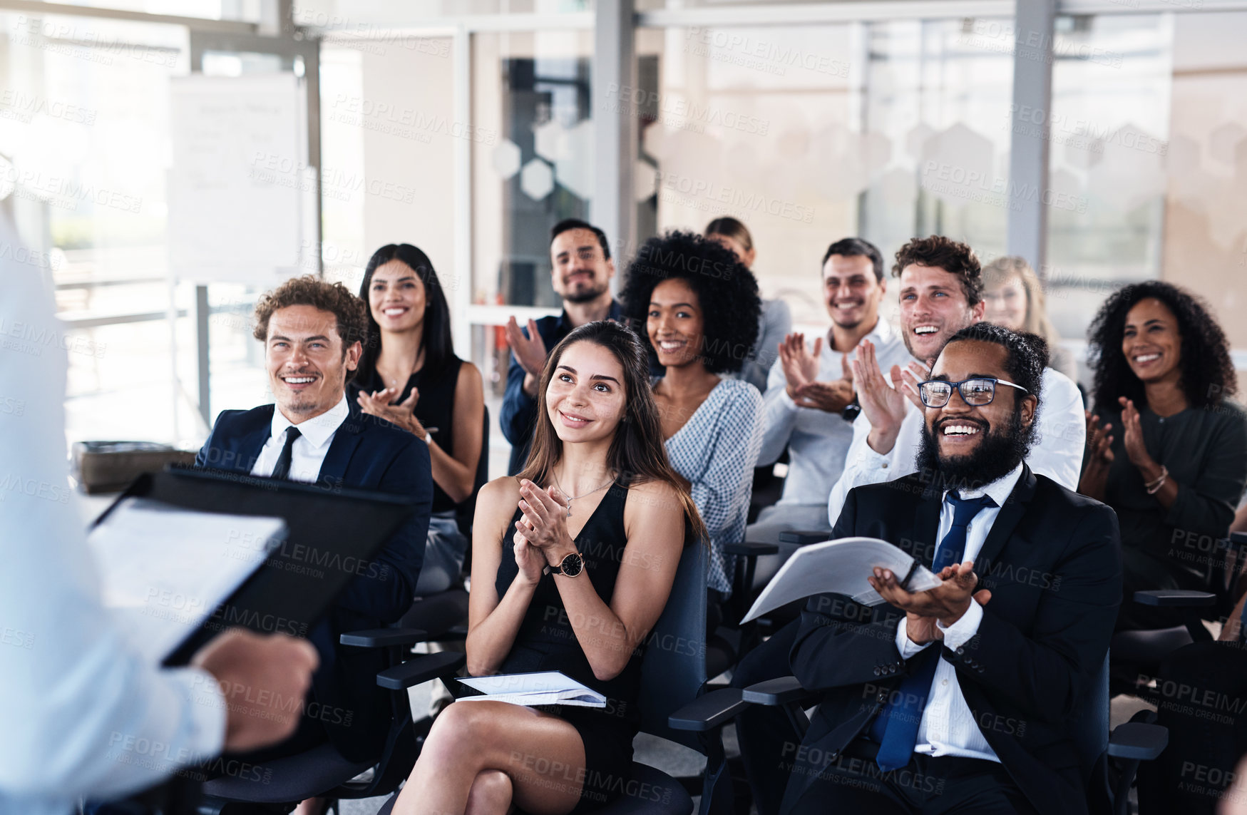 Buy stock photo Cropped shot of a group of businesspeople clapping during a conference