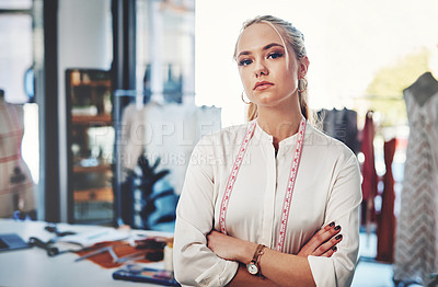 Buy stock photo Shot of a successful young fashion designer in her workshop