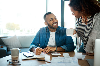 Buy stock photo Couple talk about budget, finance and bills with paperwork of financial information, happy with savings and income. Mortgage, insurance and taxes, man and woman laugh together with home bookkeeping