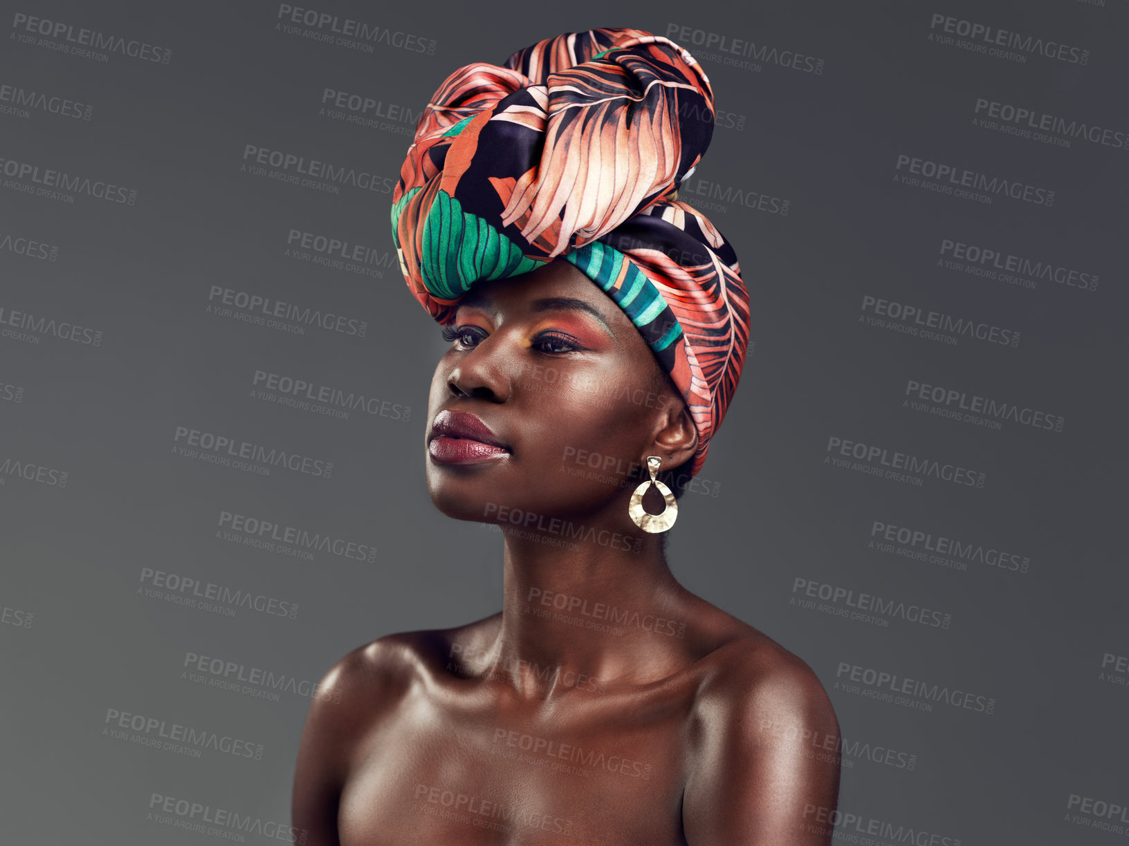 Buy stock photo Beauty, African fashion and face of black woman in studio with glamour, cosmetics and makeup. Thinking, luxury and female person in exotic jewellery, African style and head scarf on gray background