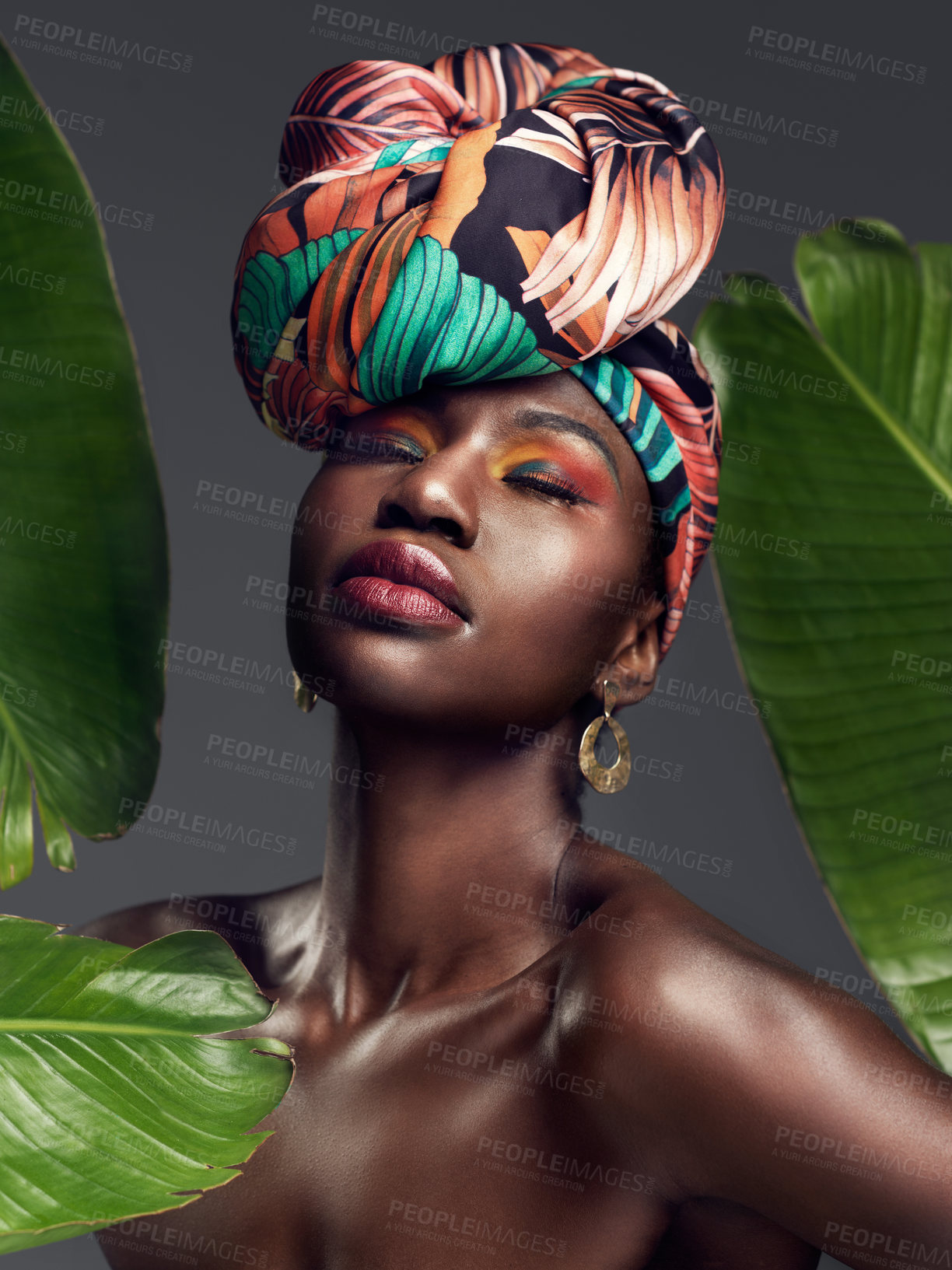 Buy stock photo Beauty, leaf and makeup by black woman in studio for self love or natural cosmetics on grey background. Culture, monstera and face of African lady model with plant for dermatology or jungle aesthetic