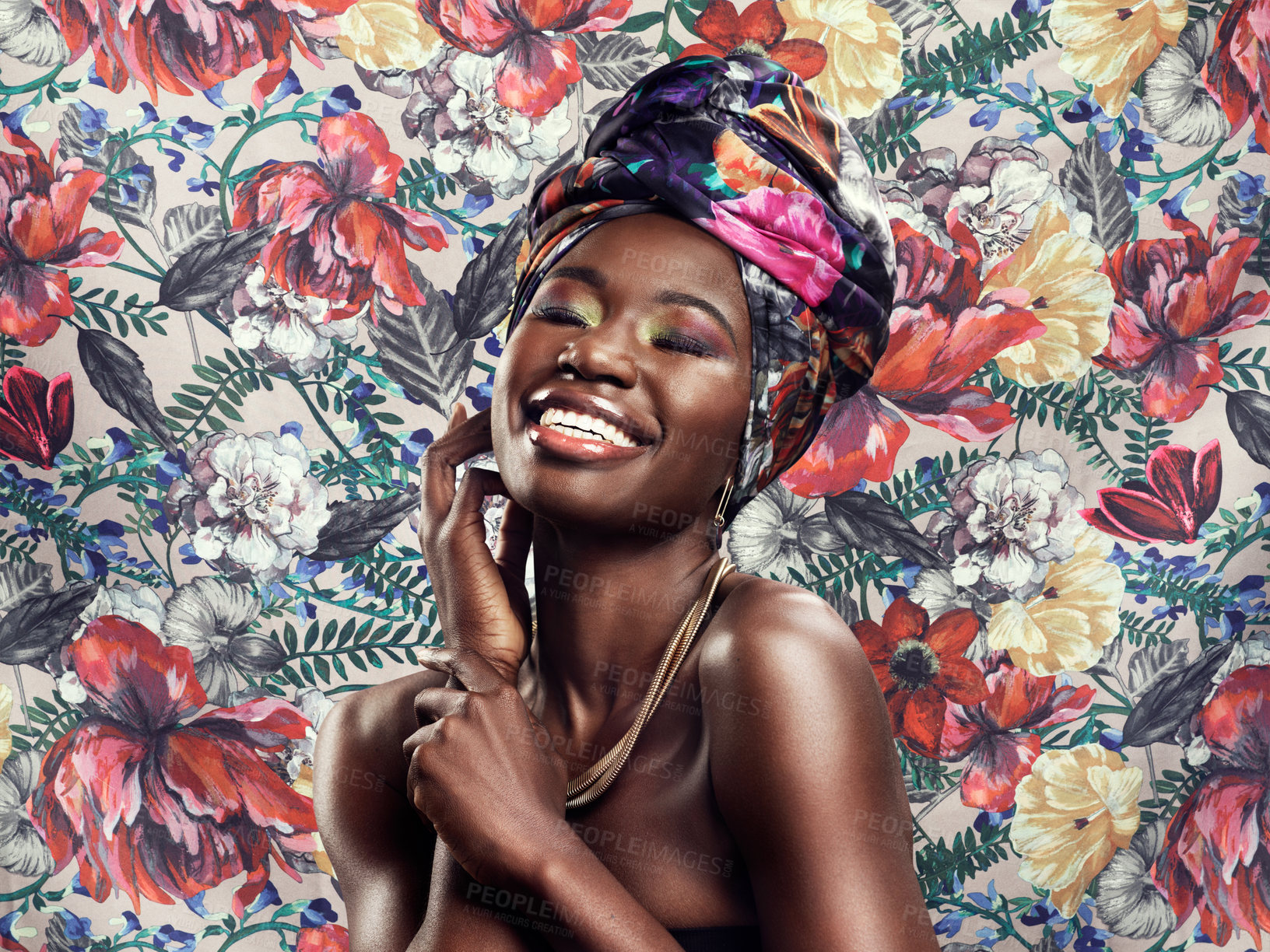 Buy stock photo Head wrap, flowers and black woman with fashion, cheerful and happiness against floral background. Funny, happy model and female person with a turban, stylish and trendy with joy, smile and confident