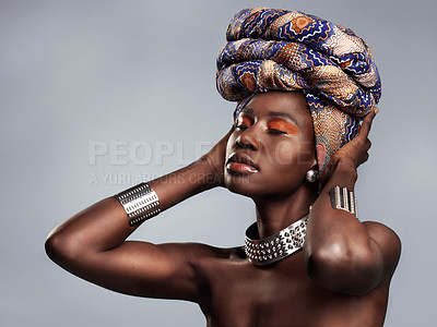Buy stock photo Black woman in traditional turban, fashion and beauty with makeup isolated on studio background. Natural cosmetics, confidence and female model with African head wrap, cosmetic glow and style