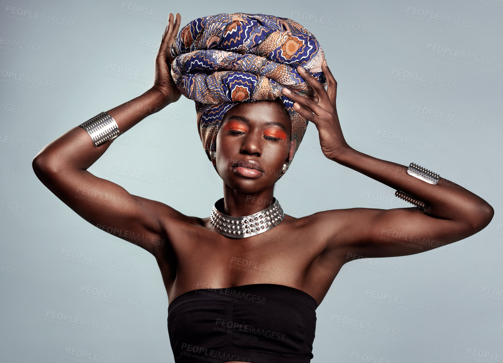 Buy stock photo African fashion, makeup and black woman in studio on white background with luxury, cosmetics and beauty. Glamour, luxury and face of female person glow in exotic jewelry, traditional style and scarf