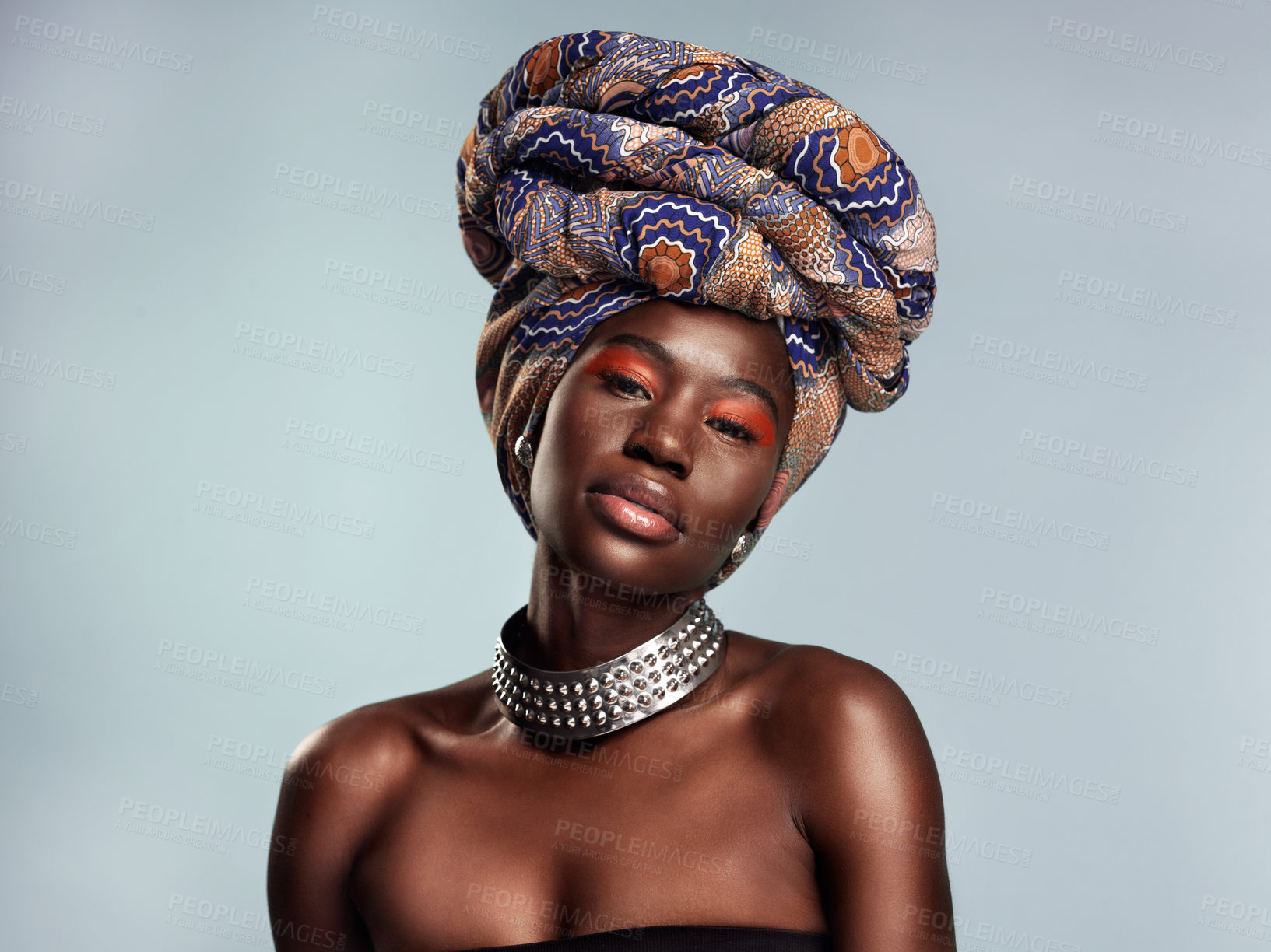 Buy stock photo Black woman in African turban, portrait with fashion and beauty, makeup isolated on studio background. Natural cosmetics, glow and female model with traditional head wrap, mockup space and style