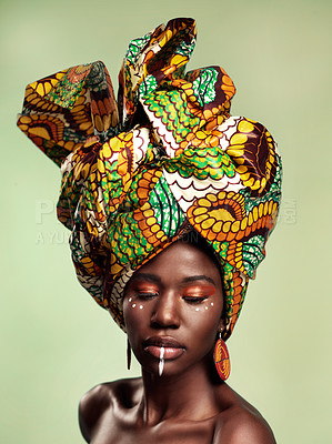 Buy stock photo Beauty, black woman and queen makeup with African head wrap and pride with fashion. Isolated, green background and young female person with a traditional hair scarf with confidence and culture 