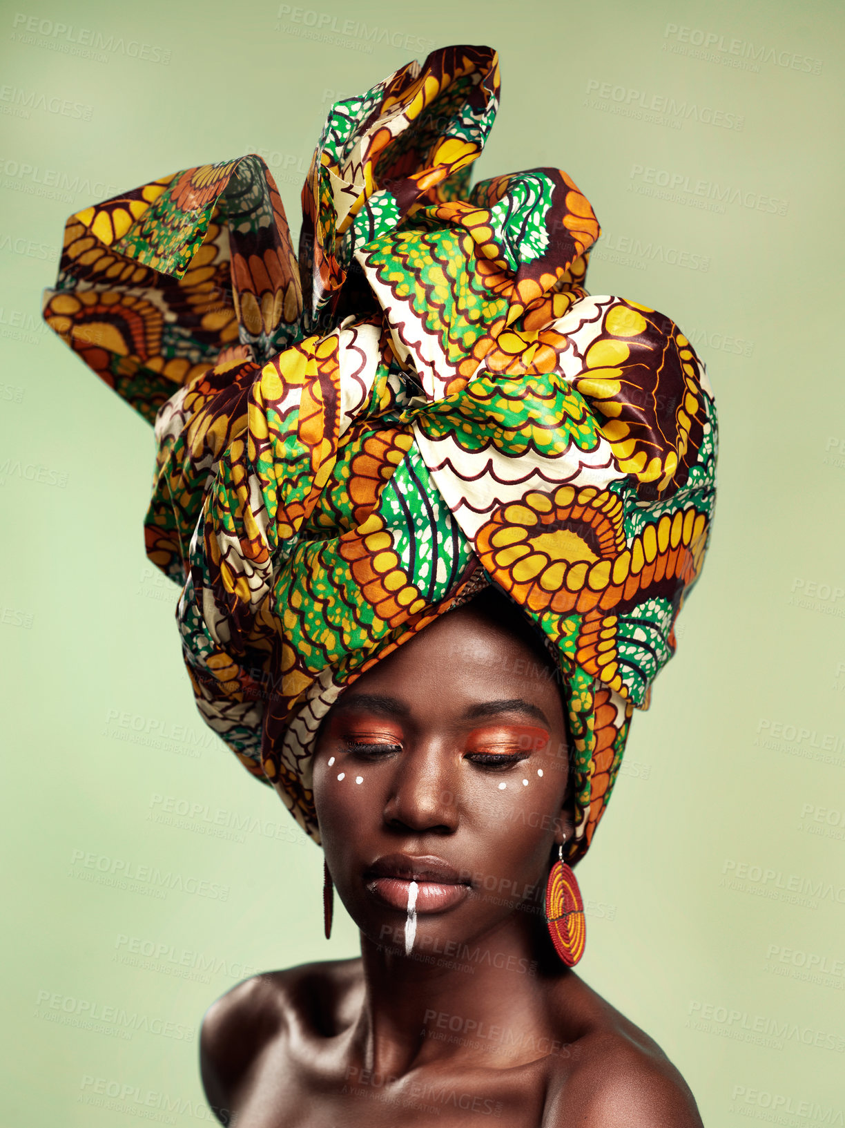 Buy stock photo Beauty, black woman and queen makeup with African head wrap and pride with fashion. Isolated, green background and young female person with a traditional hair scarf with confidence and culture 