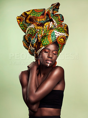 Buy stock photo Beauty, black woman fashion and cosmetics with African head wrap and makeup in studio. Isolated, green background and young female person with a traditional hair scarf with confidence and culture 