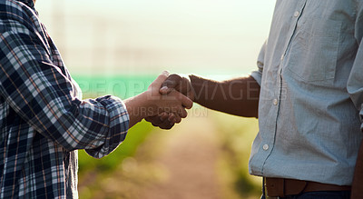Buy stock photo Partnership, teamwork and unity by handshake, two farmers starting organic trade together. Sustainable farm owners meeting, greeting, entering a business deal. Men collaborating with a goal or vision