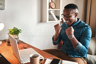 Buy stock photo Excited male on a home computer feeling happy, confident and proud about winning an online casino web game. Smiling man enjoying a digital win indoors. Guy celebrating success and having fun inside