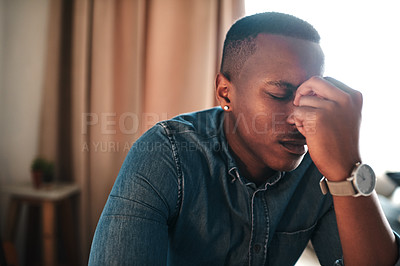 Buy stock photo Headache, stress and burnout at home, young man suffering from fatigue and exhaustion. Frustrated, failing small business owner annoyed and under pressure from a heavy workload while working remotely
