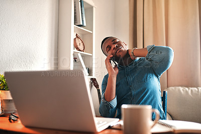 Buy stock photo Tired business man with neck pain on a laptop and phone call, looking stressed and stretching bad, strained muscle or sore back. Stressed, multitasking guy having a difficult time working from home
