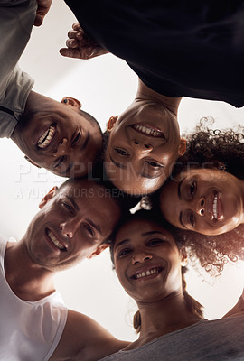 Buy stock photo Low angle shot of a group of young people huddling in solidarity at a gym
